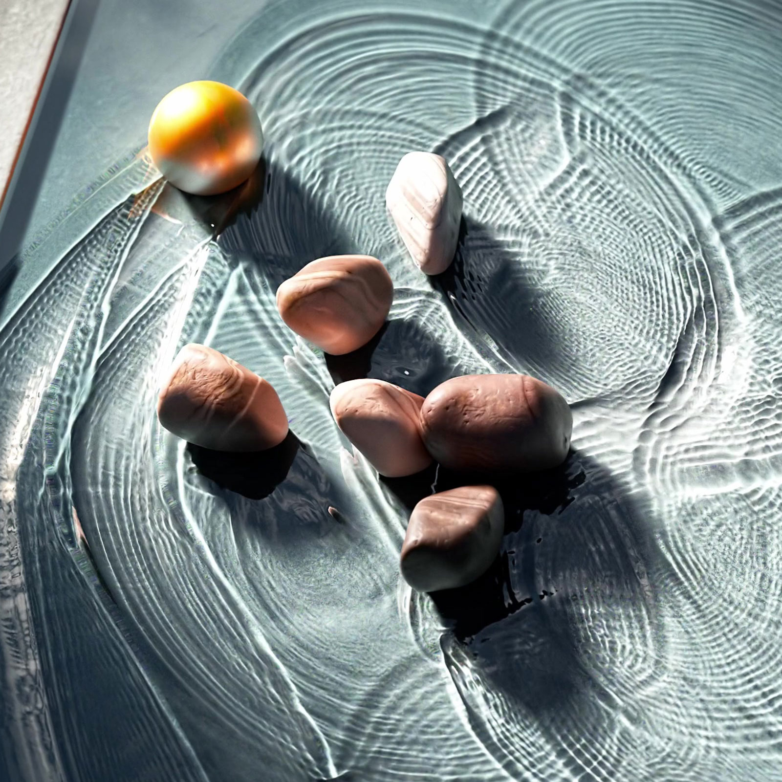 Transparent stones casting patterned light