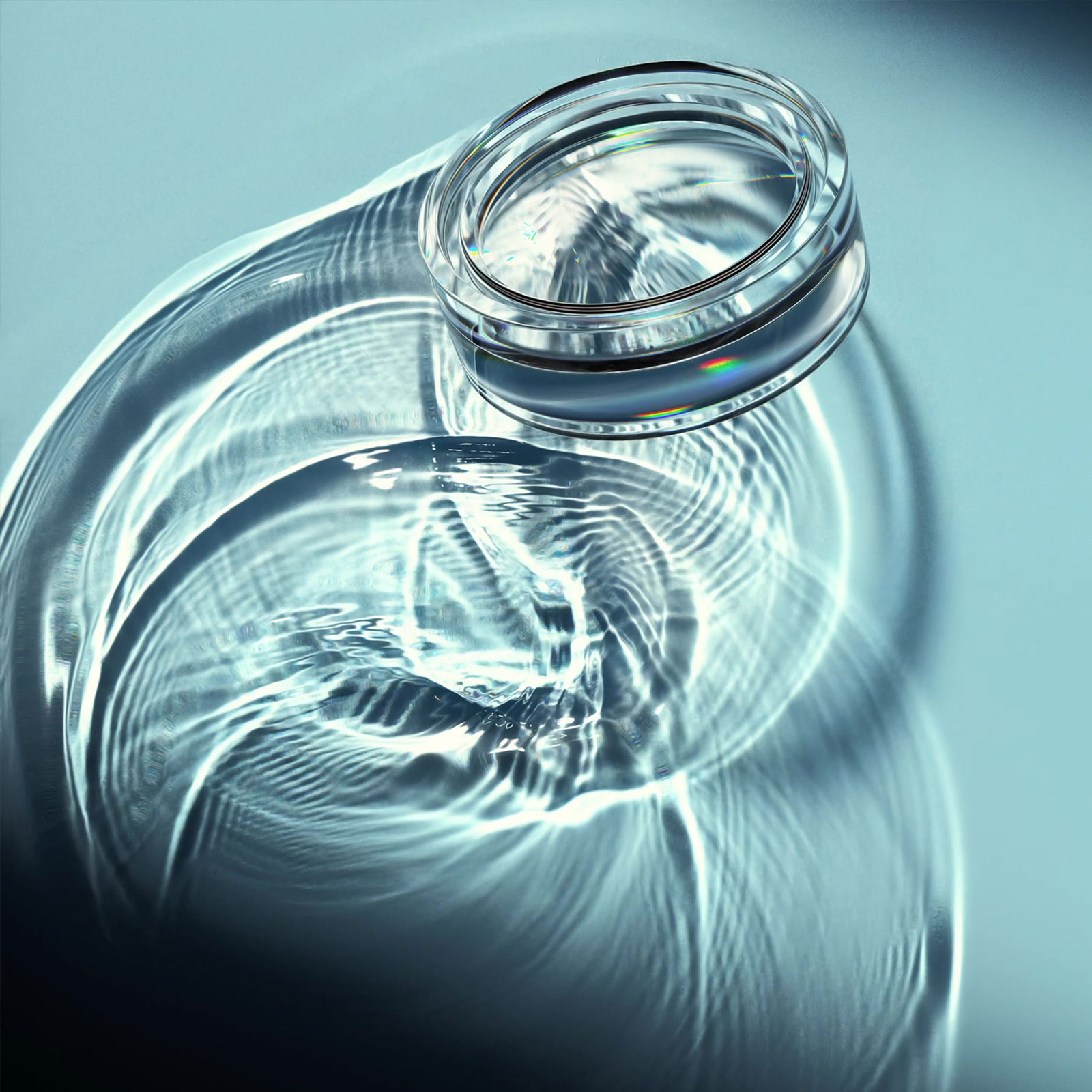 Glass product form illuminated by a focused caustic beam